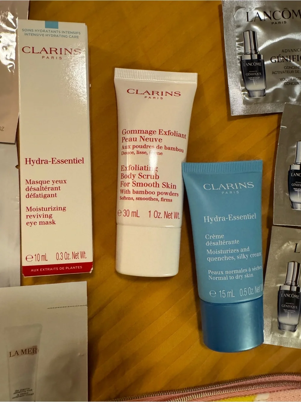 Clarins Pouch with Clarins and other product samples